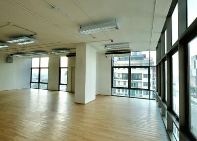 spacious open-plan office with large windows