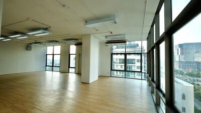 Spacious modern office space with large windows