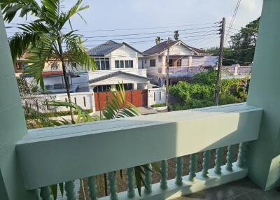 Spacious balcony with a view of the neighborhood