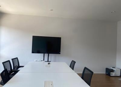 Conference room with a large table and chairs