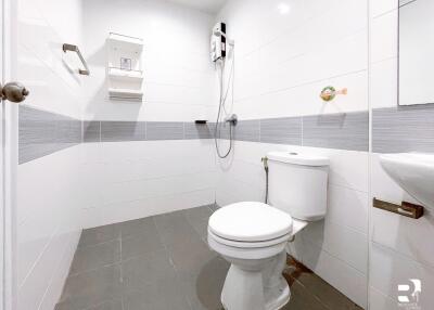 Modern bathroom with white and gray tile accents