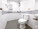 Modern bathroom with white and gray tile accents