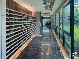 Mailroom with rows of mailboxes in modern building