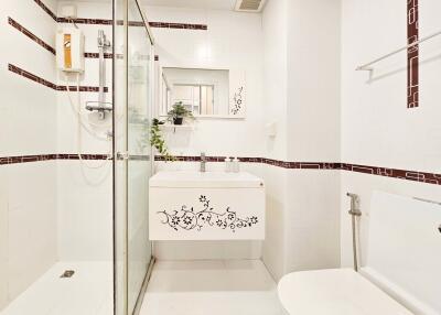 Modern bathroom with a sleek design and shower enclosure