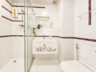 Modern bathroom with a sleek design and shower enclosure