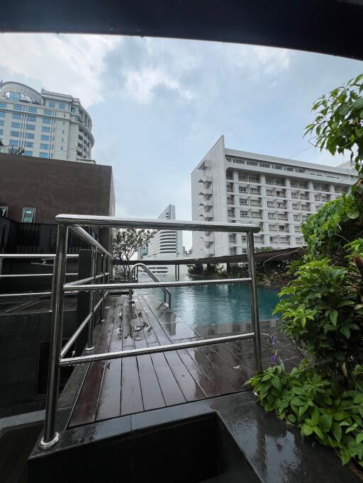 Rooftop pool area with city view