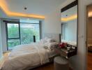 Modern bedroom with large windows and city view