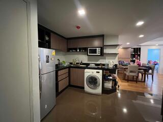 Modern kitchen with appliances and ample space