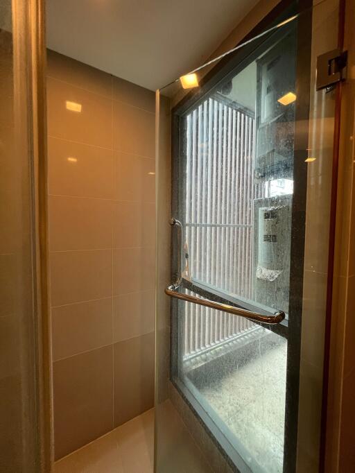 Shower area with glass door