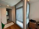 Hallway in a modern apartment with a view into the bathroom