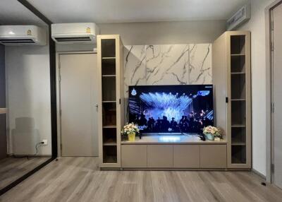 Modern living room with TV and cabinets