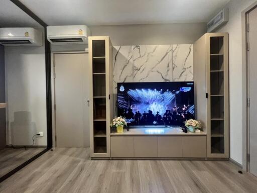 Modern living room with TV and cabinets