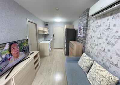 Compact living area with modern kitchenette