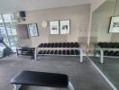 Modern gym with equipment and mirrors