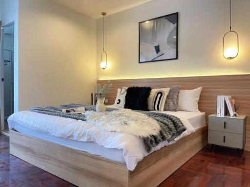 Modern bedroom with cozy decor