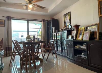 Bright room with dining area and various decorations