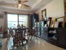 Bright room with dining area and various decorations