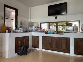 Cozy kitchen with wooden cabinets and modern appliances