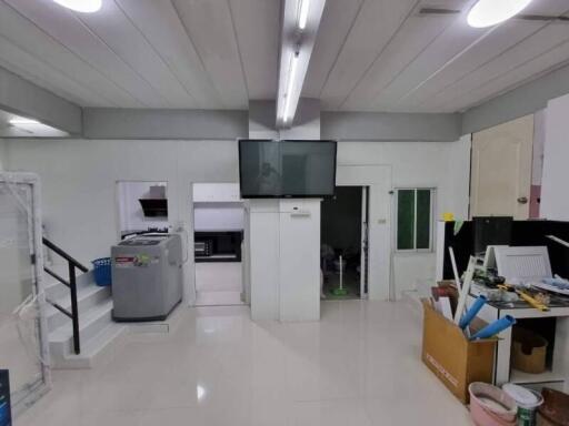 utility room with appliances and storage