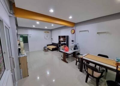 Spacious living and dining area with ample seating and study space