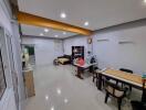 Spacious living and dining area with ample seating and study space