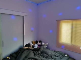 Bedroom with bed and soft toys