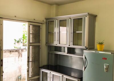 Modern kitchen with metallic cabinets and appliances