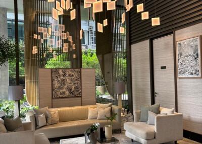 Modern living room with contemporary furniture and chandelier