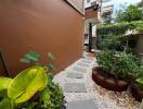 Outdoor garden with plants and stone pathway