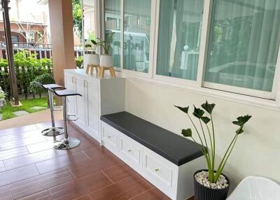 Modern balcony with seating and storage