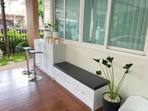 Modern balcony with seating and storage