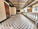 Covered outdoor hallway with tiled floor