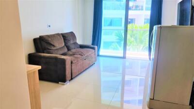 Living room with sofa and large window