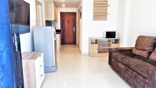 Living room with appliances and furniture