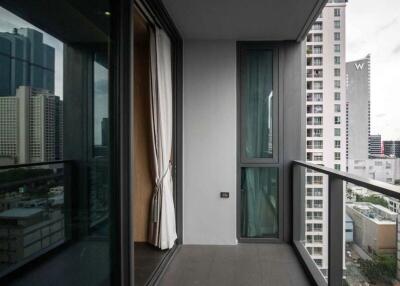 Modern high-rise apartment balcony with city view