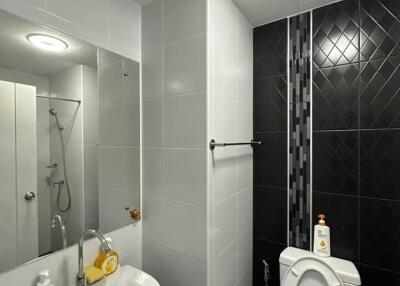 Modern bathroom with sink and toilet