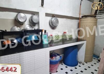 Organized kitchen with utensils and containers