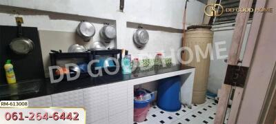 Organized kitchen with utensils and containers