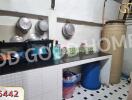 Organized kitchen with utensils and containers