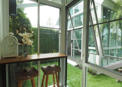 Bright sunroom with large windows