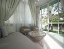 Bright sunroom with cozy seating