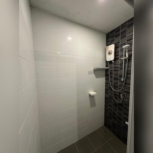 Modern shower area with electric water heater