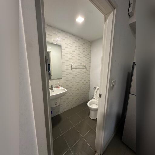 Well-lit bathroom with modern fixtures