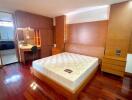 Spacious Bedroom with Wooden Floors