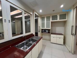 Modern kitchen with built-in cabinets and sink