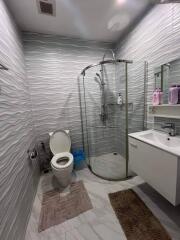 Modern bathroom with shower and toilet