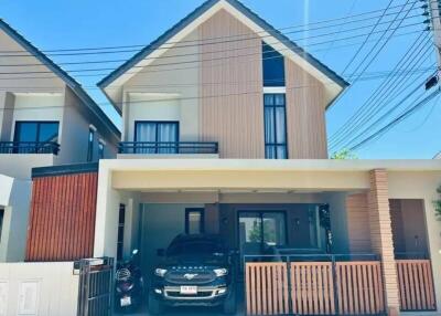 Modern residential house with parking area