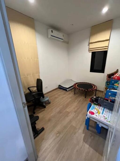 Bedroom with exercise and play area