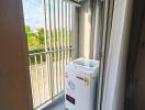 Balcony with washing machine and air conditioning unit