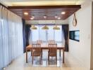 Modern dining area with wooden accents and large windows